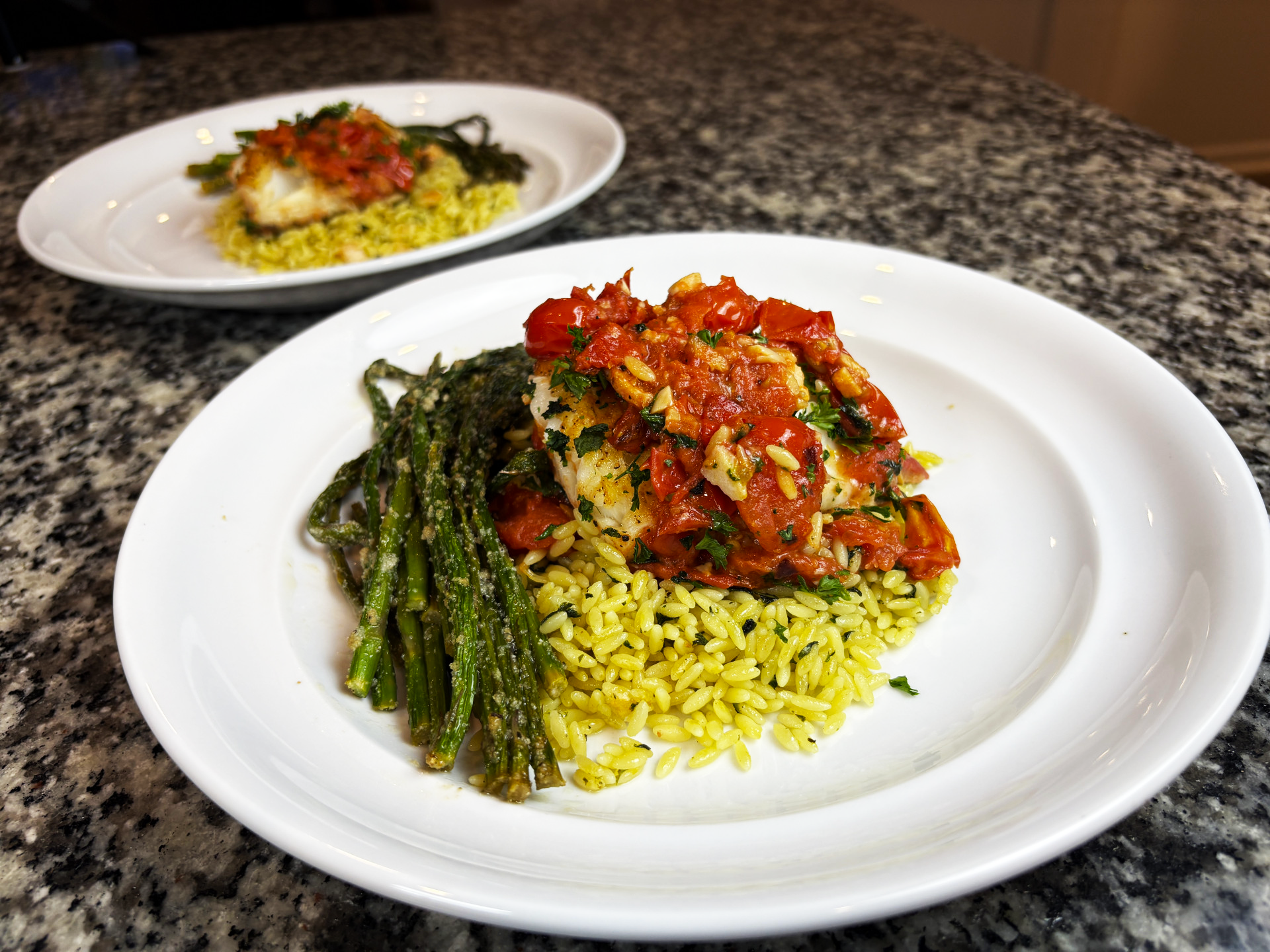 Chilean Sea Bass with Burst Cherry Tomatoes and Garlic