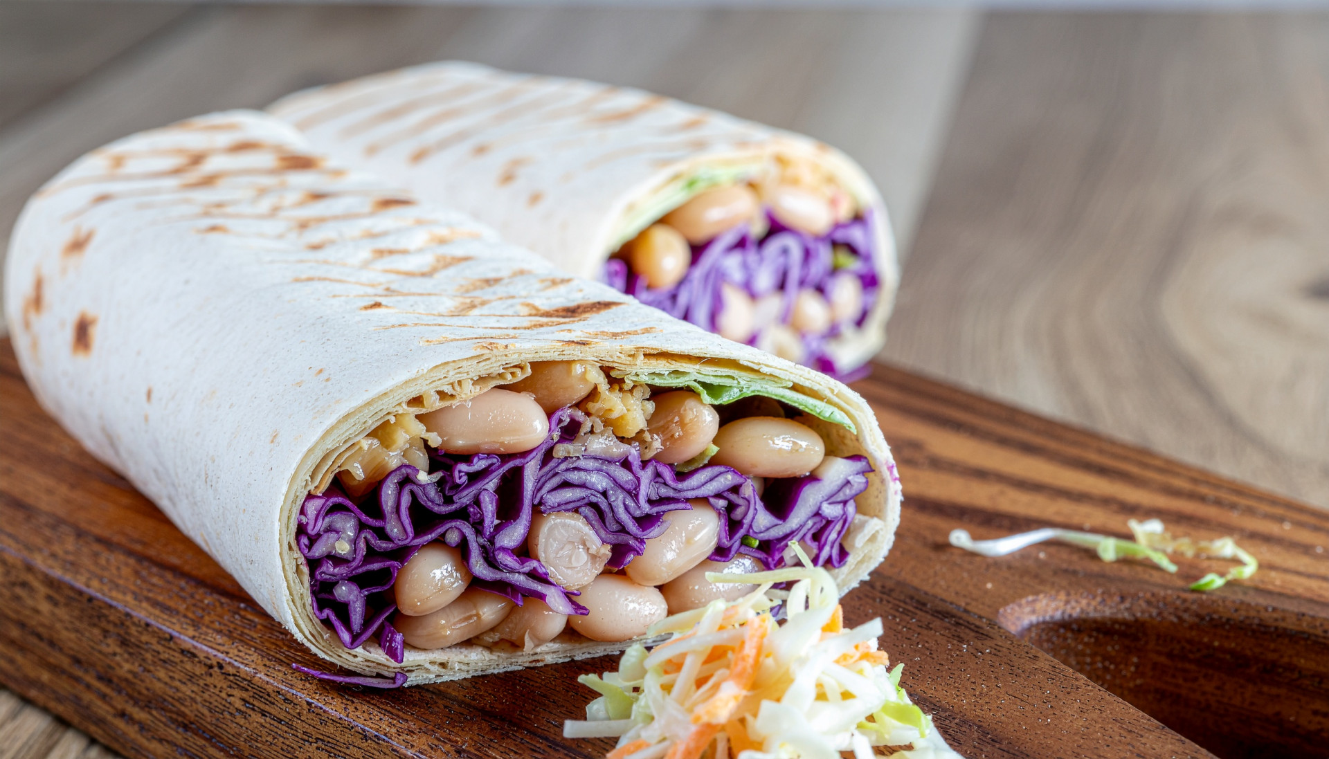 White Bean Street Salad Wrap - Tortilla wrapped with mashed beans, cabbage and yogurt