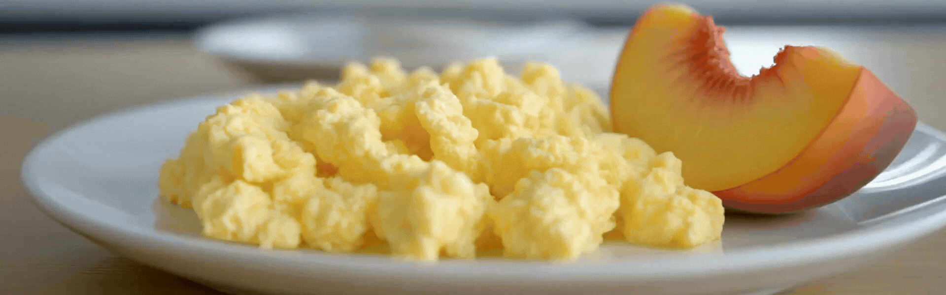 Breakfast: 2 Scrambled Eggs with Sliced Peach