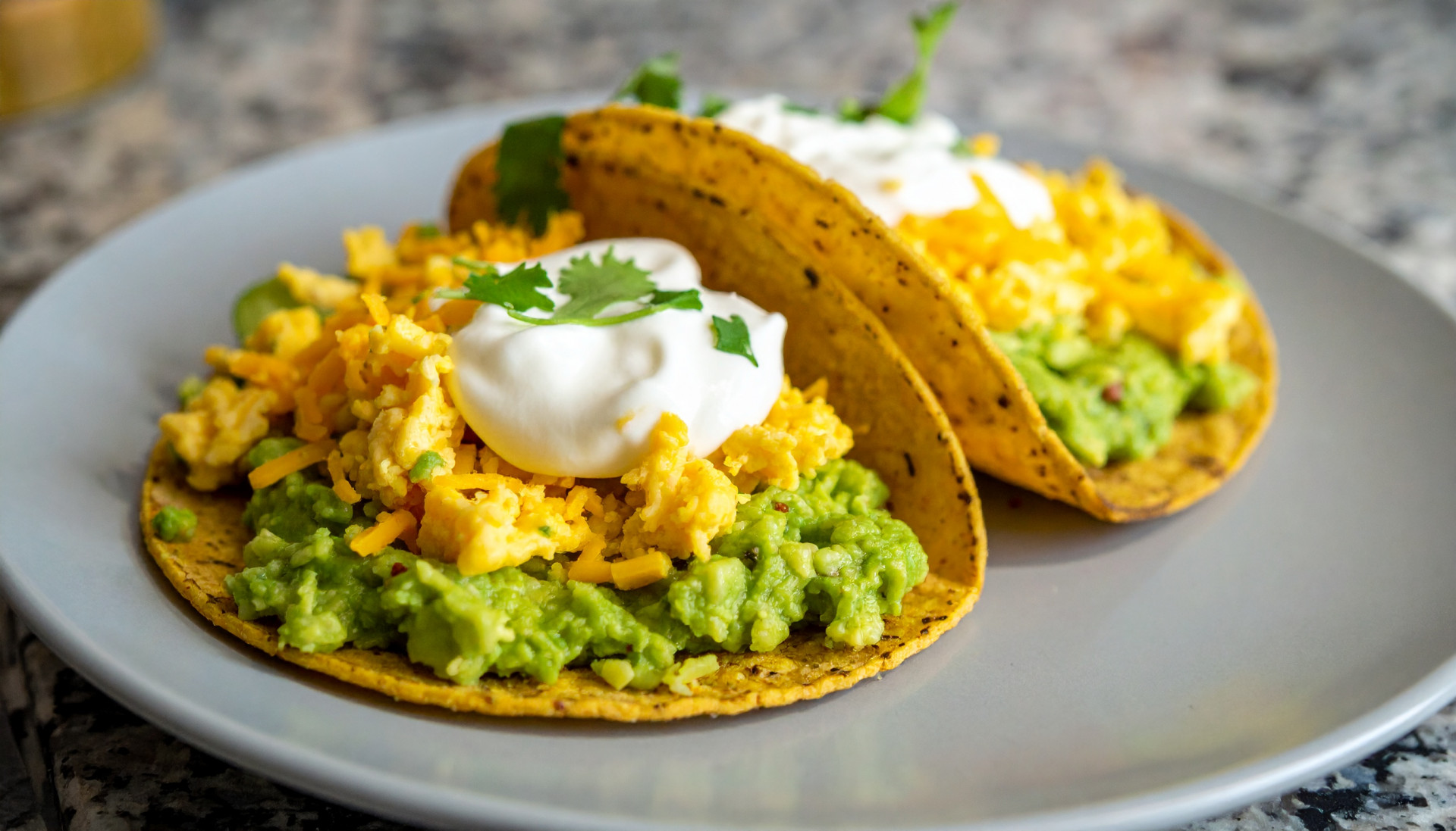 Crispy Breakfast Tacos with Avocado-Lime Crema