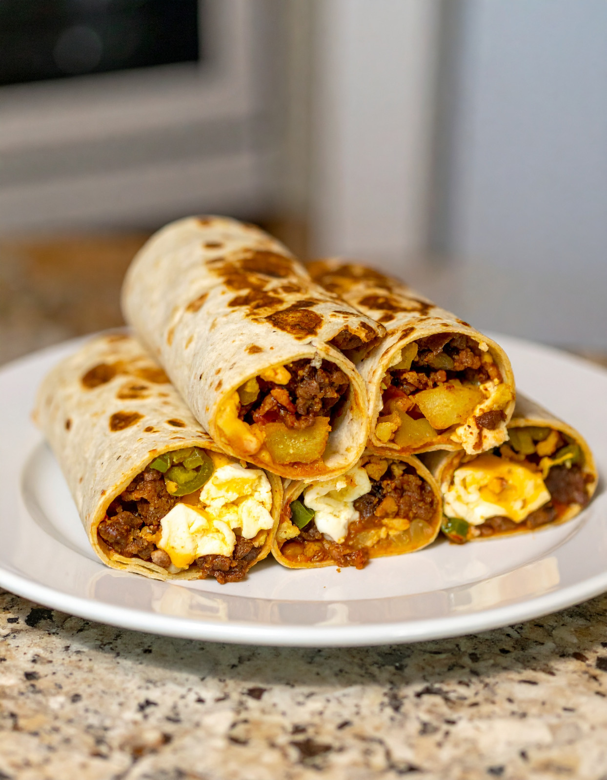 Loaded Cheesy Beef & Crispy Potato Breakfast Burritos
