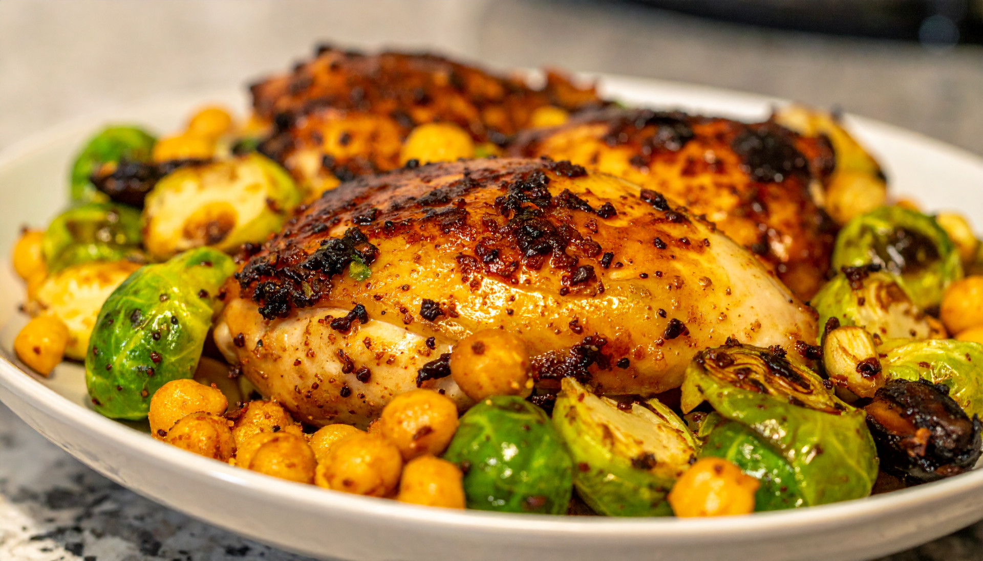 Hot Honey Lemon Chicken with Crispy Chickpeas & Charred Brussels Sprouts