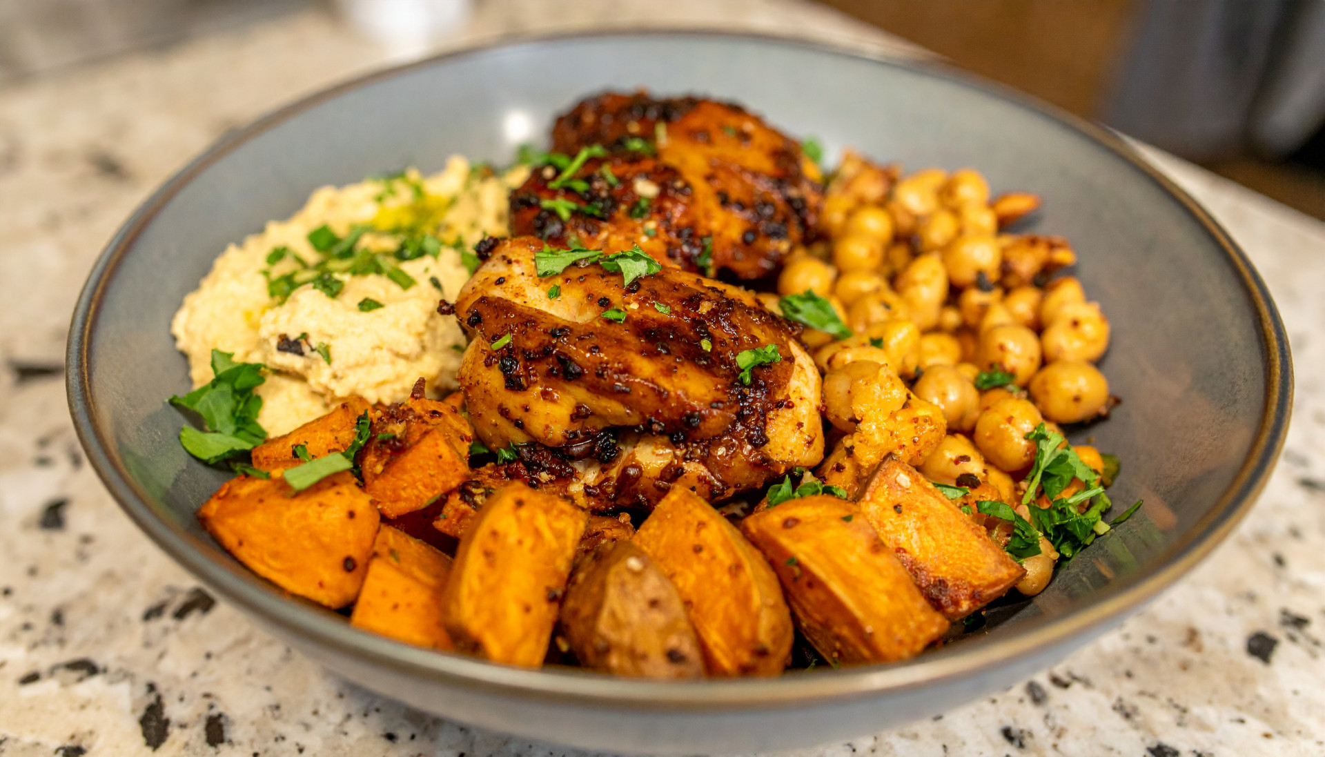 Hot Honey Chicken Bowls with Crispy Sweet Potatoes & Herby White Bean Hummus