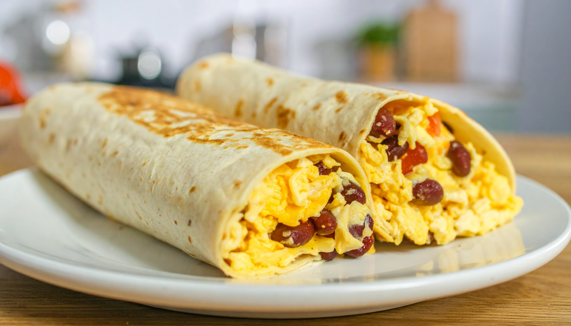 Cheesy egg and bean breakfast wraps