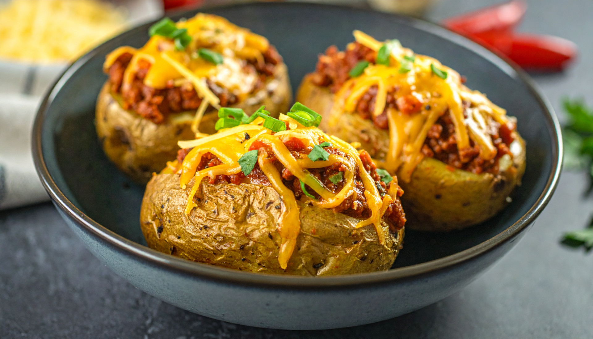 Chili-stuffed baked potatoes