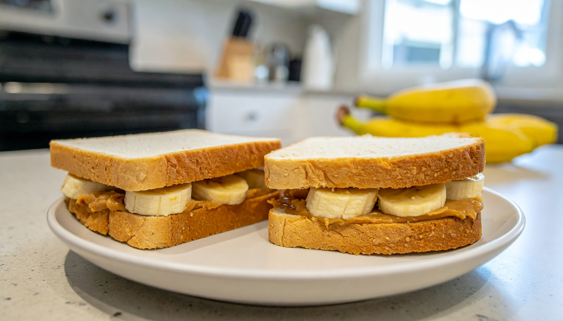 Peanut butter banana sandwiches on a plate