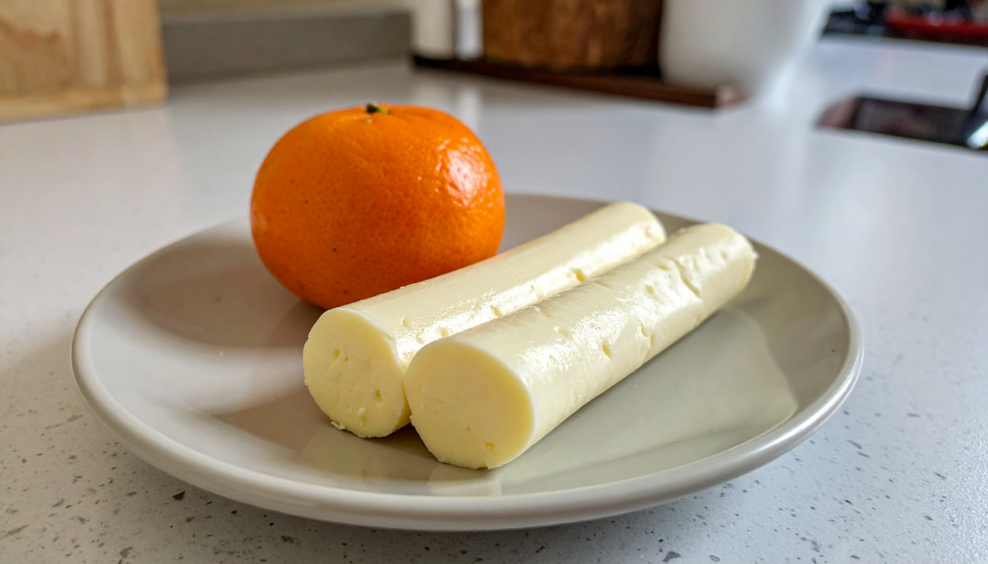 String cheese with a mandarin