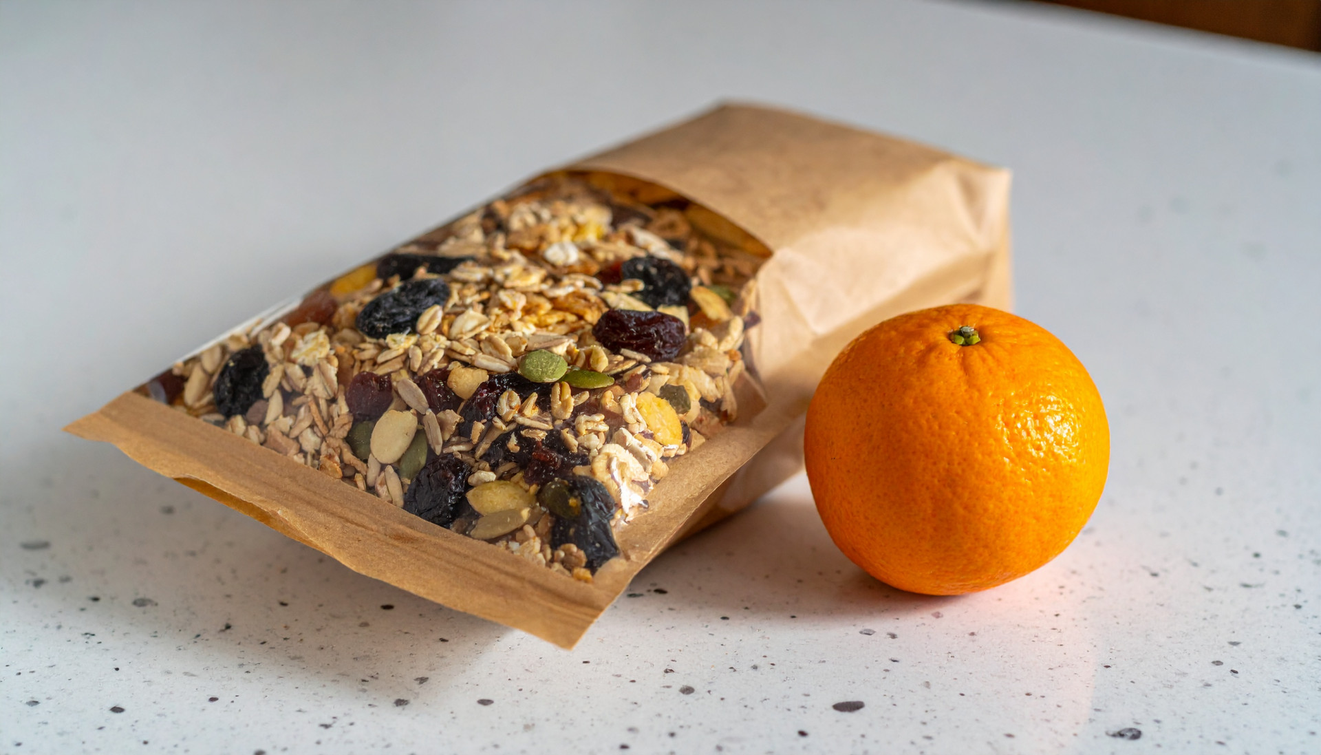 Trail mix bag with pumpkin seeds, oat cereal, and raisins