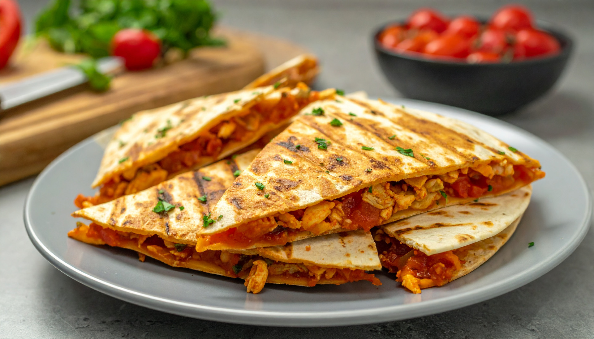 Salsa chicken quesadilla wedges on a plate