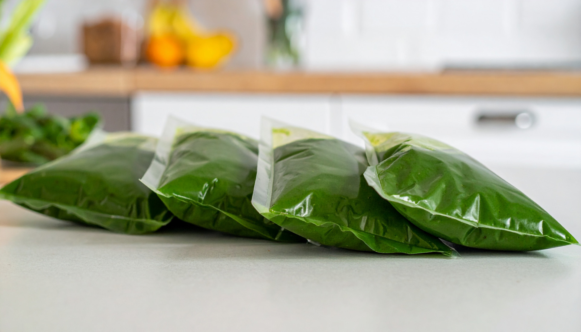 Four flat frozen smoothie bags