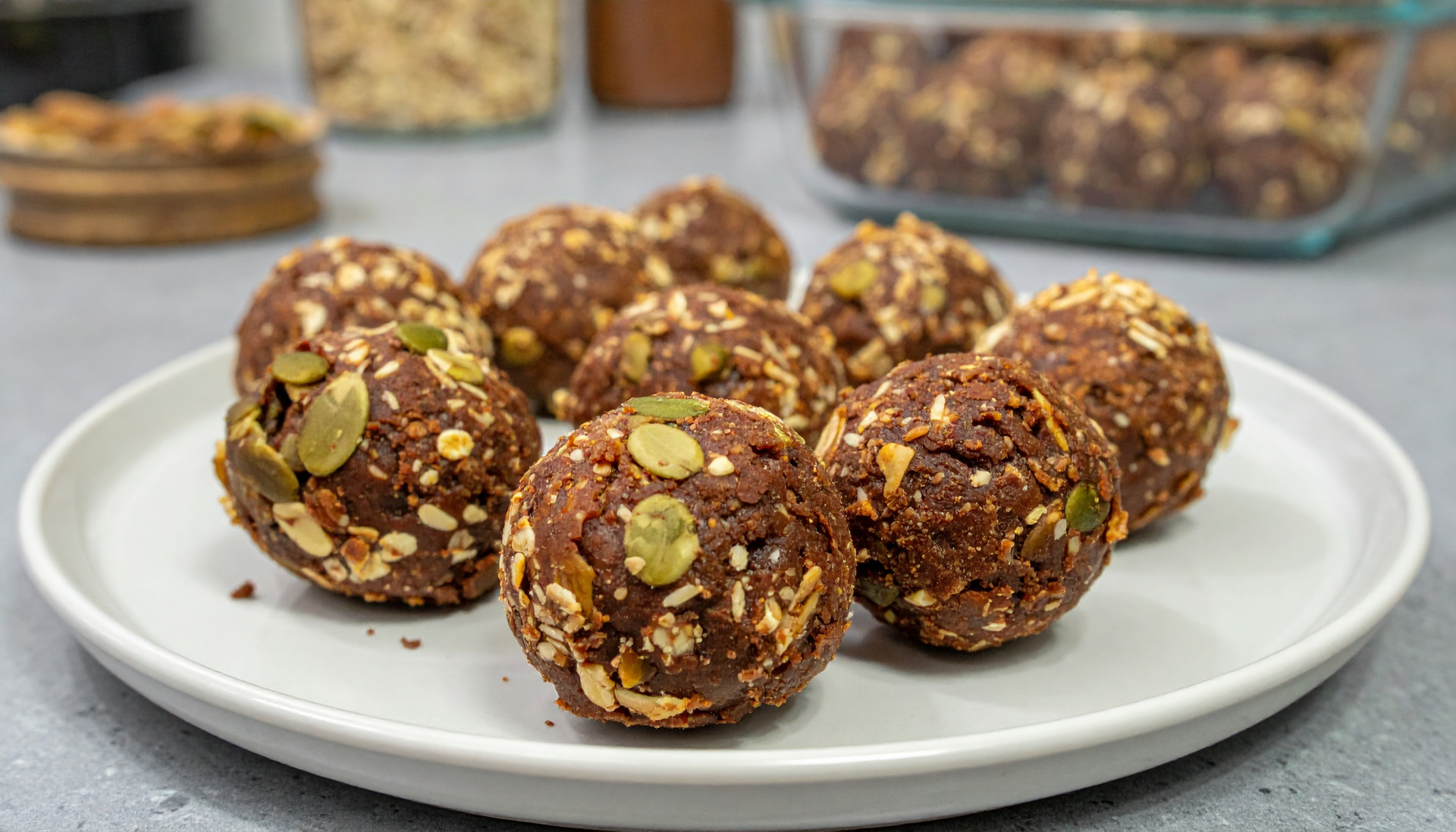 Cocoa pumpkin seed bites on a plate